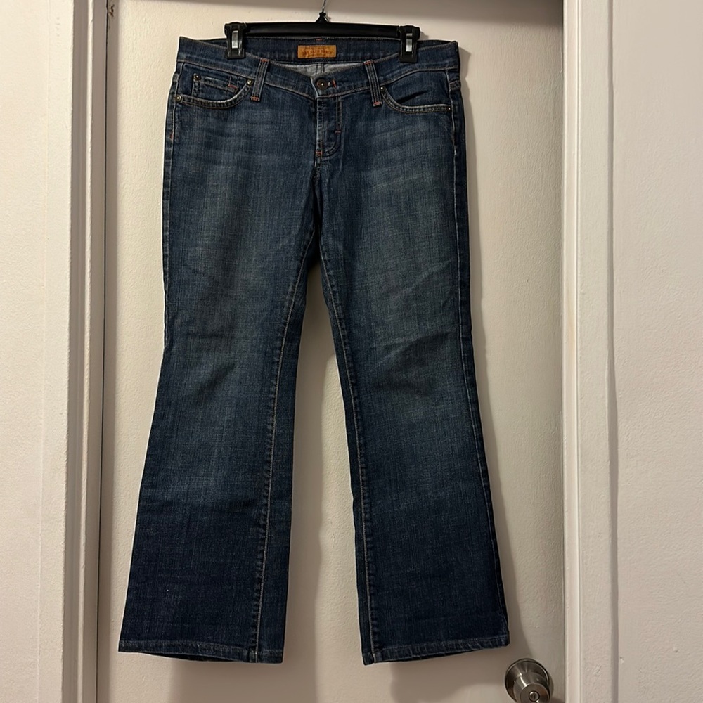 Dry aged denim lightly worn blue jeans, bootcut